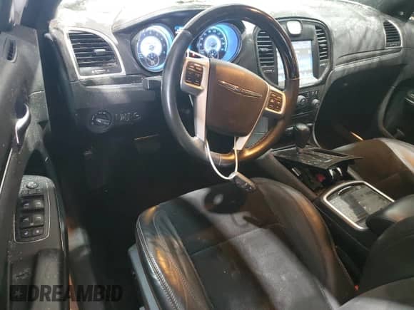 2013 Chrysler 300 C с VIN 2C3CCAET1DH551489, выставлен на аукционе Copart как лот 63487005 с пробегом 65 001 миль миль и Списание • Salvage title. История ставок и продаж доступна на DreamBid. Изображение 8.