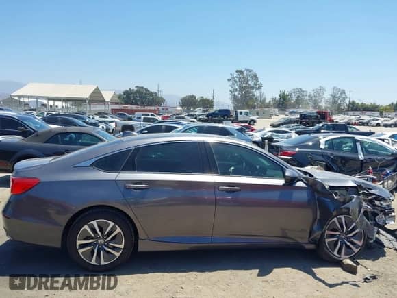 2019 Honda Accord with VIN 1HGCV3F10KA020537, listed as a IAAI auction lot 42859527 with 101,672 mi miles and . Bid and sale history available at DreamBid. Image 13.