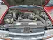 1998 Chevrolet Blazer LS z VIN 1GNDT13W4W2195619, wystawiony jako Copart lot #65487945 z przebiegiem 155 740 mil mil oraz Szkoda całkowita • Salvage title. Historia ofert i sprzedaży dostępna na DreamBid. Obrazek 12.