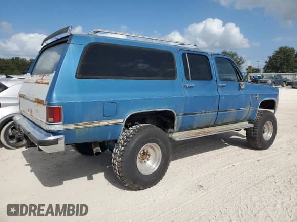 1988 Chevrolet Suburban с VIN 1GNEV16K8JF196619, выставлен на аукционе Copart как лот 78754204 с пробегом 91 294 миль миль и Списание • Salvage title. История ставок и продаж доступна на DreamBid. Изображение 3.