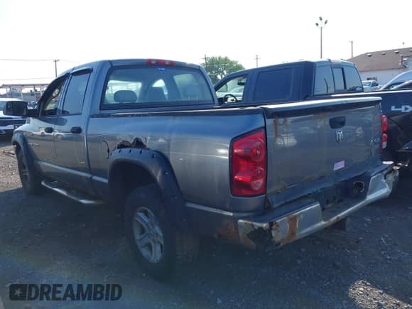 2007 Dodge 1500 SLT with VIN 1D7HU18287J558465, listed as a IAAI auction lot 42839883 with 203,171 mi miles and . Bid and sale history available at DreamBid. Image 3.