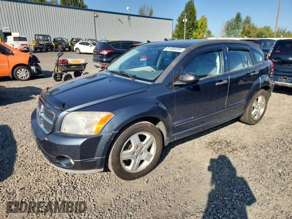 2007 Dodge Caliber SXT with VIN 1B3HB48B77D592513, listed as a Copart auction lot 81588395 with 194,376 mi miles and Salvage title. Bid and sale history available at DreamBid. Image 1.