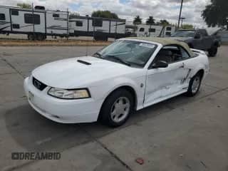 1999 Ford Mustang z VIN 1FAFP4449XF190680, wystawiony jako Copart lot #80028085 z przebiegiem 207 318 mil mil oraz Szkoda całkowita • Salvage title. Historia ofert i sprzedaży dostępna na DreamBid. Obrazek 1.