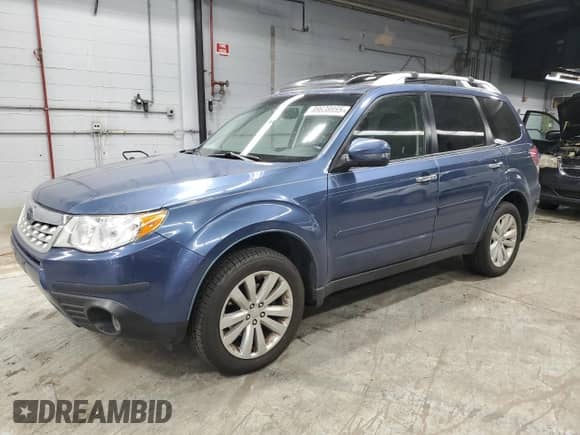 2011 Subaru Forester X Touring z VIN JF2SHBGCXBH773156, wystawiony jako Copart lot #89638955 z przebiegiem 141 531 mil mil oraz Czysty tytuł • Clean title. Historia ofert i sprzedaży dostępna na DreamBid. Obrazek 1.