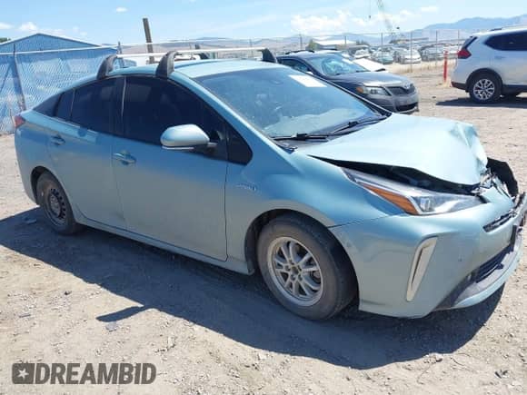 2021 Toyota Prius LE with VIN JTDL9MFU9M3023818, listed as a IAAI auction lot 42842899 with 99,876 mi miles and . Bid and sale history available at DreamBid. Image 1.