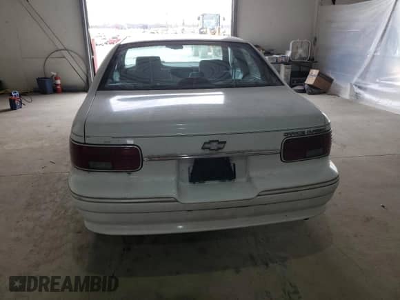 1994 Chevrolet Caprice с VIN 1G1BL52W9RR144727, выставлен на аукционе Copart как лот 49951855 с пробегом Не указан миль и Чистый • Clean title. История ставок и продаж доступна на DreamBid. Изображение 6.