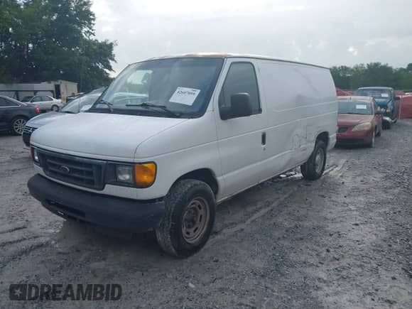 2005 Ford Econoline Cargo with VIN 1FTRE14W65HA89689, listed as a IAAI auction lot 42607059 with 260,935 mi miles and . Bid and sale history available at DreamBid. Image 2.