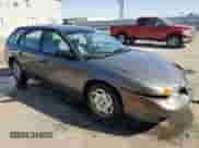 2000 Saturn SW with VIN 1G8ZN827XYZ131326, listed as a Copart auction lot 76143544 with 81,922 mi miles and Salvage title. Bid and sale history available at DreamBid. Image 4.