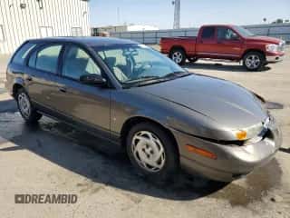 2000 Saturn SW с VIN 1G8ZN827XYZ131326, выставлен на аукционе Copart как лот 76143544 с пробегом 81 922 миль миль и Списание • Salvage title. История ставок и продаж доступна на DreamBid. Изображение 4.