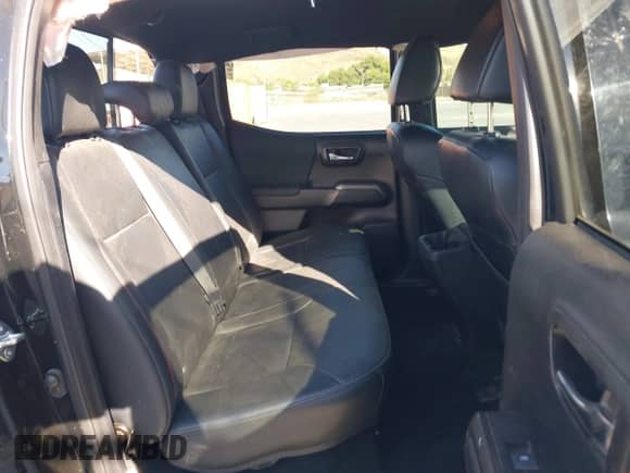 2018 Toyota Tacoma SR with VIN 5TFCZ5AN6JX156482, listed as a IAAI auction lot 42643556 with 112,895 mi miles and . Bid and sale history available at DreamBid. Image 8.