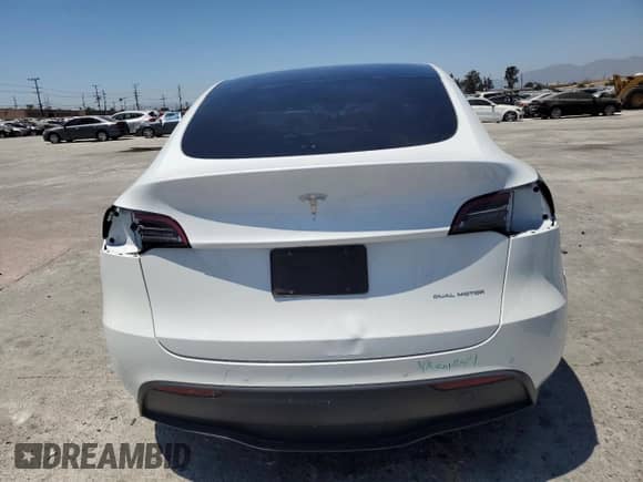 2021 Tesla Model Y Long Range с VIN 5YJYGDEE8MF262978, выставлен на аукционе Copart как лот 65747354 с пробегом 36 710 миль миль и Списание • Salvage title. История ставок и продаж доступна на DreamBid. Изображение 6.