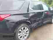 2021 Chevrolet Traverse Premier with VIN 1GNEVKKW1MJ271936, listed as a IAAI auction lot 42311061 with 41,147 mi miles and . Bid and sale history available at DreamBid. Image 6.