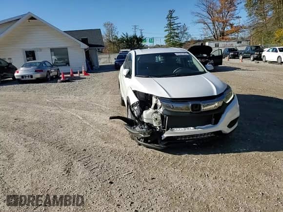 2022 Honda HR-V LX с VIN 3CZRU6H3XNM709045, выставлен на аукционе Copart как лот 82567595 с пробегом 73 623 миль миль и Списание • Salvage title. История ставок и продаж доступна на DreamBid. Изображение 14.