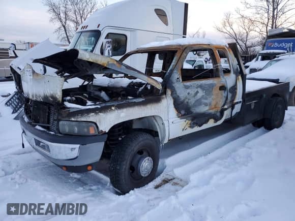 1998 Dodge 3500 с VIN 1B7MF3366WJ241288, выставлен на аукционе Copart как лот 49095745 с пробегом Не указан миль и На запчасти • Non repairable. История ставок и продаж доступна на DreamBid. Изображение 1.