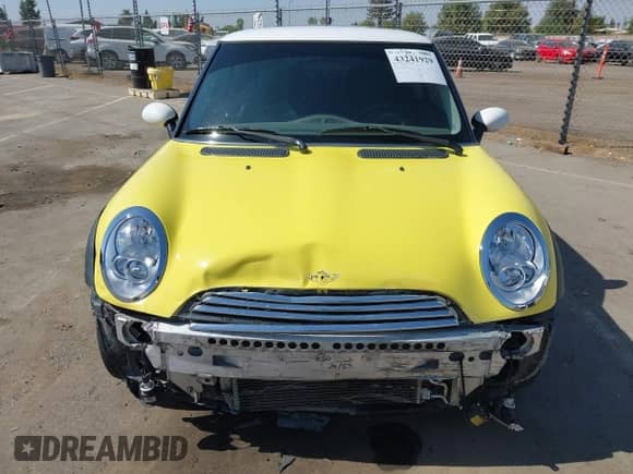 2004 MINI Hardtop with VIN WMWRC33424TJ62339, listed as a IAAI auction lot 43241929 with 147,645 mi miles and . Bid and sale history available at DreamBid. Image 13.