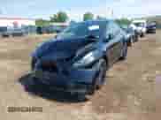 2022 Tesla Model Y Long Range z VIN 7SAYGDEE8NF434074, wystawiony jako IAAI lot #42522198 z przebiegiem 37 469 mil mil oraz . Historia ofert i sprzedaży dostępna na DreamBid. Obrazek 11.