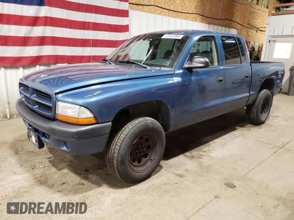 2003 Dodge Dakota Sport z VIN 1D7HG38X33S149289, wystawiony jako Copart lot #72442394 z przebiegiem 164 177 mil mil oraz Czysty tytuł • Clean title. Historia ofert i sprzedaży dostępna na DreamBid. Obrazek 1.