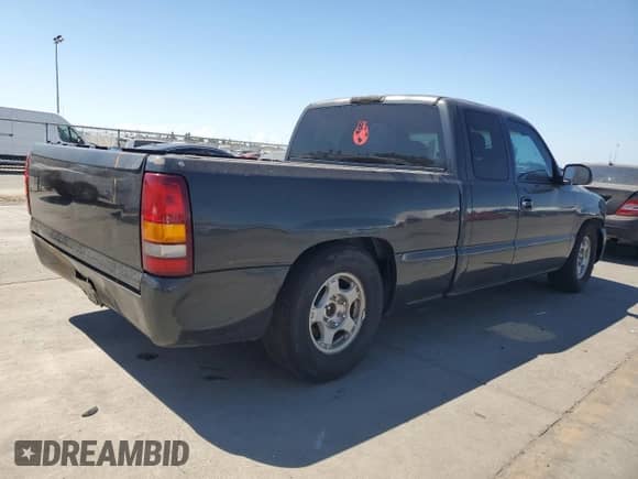 2003 GMC Sierra 1500 SLE with VIN 2GTEC19VX31143435, listed as a Copart auction lot 66678595 with 210,081 mi miles and Clean title. Bid and sale history available at DreamBid. Image 3.
