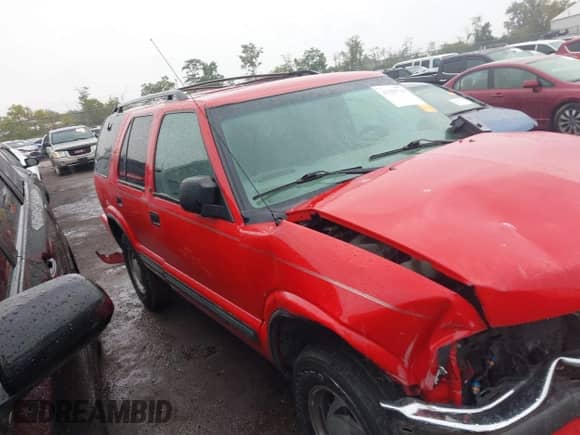 2001 Chevrolet Blazer LT with VIN 1GNDT13W412220057, listed as a IAAI auction lot 43255739 with Not provided miles and . Bid and sale history available at DreamBid. Image 14.