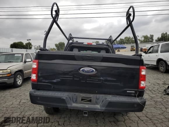 2022 Ford F-150 XL с VIN 1FTEX1C81NKD24854, выставлен на аукционе Copart как лот 55755525 с пробегом 87 072 миль миль и Списание • Salvage title. История ставок и продаж доступна на DreamBid. Изображение 6.