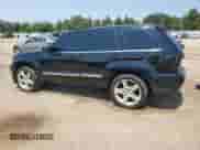 2008 Jeep Grand Cherokee SRT-8 with VIN 1J8HR78398C101363, listed as a Copart auction lot 63618635 with 124,501 mi miles and Salvage title. Bid and sale history available at DreamBid. Image 2.