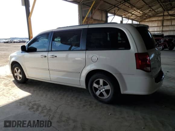 2011 Dodge Grand Caravan Mainstreet with VIN 2D4RN3DG6BR742139, listed as a Copart auction lot 71022515 with 126,565 mi miles and Salvage title. Bid and sale history available at DreamBid. Image 2.