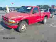 1997 Dodge Dakota with VIN 1B7GG26X5VS131317, listed as a IAAI auction lot 42527411 with 162,080 mi miles and . Bid and sale history available at DreamBid. Image 2.