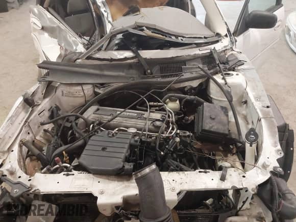 2004 Chevrolet Malibu Classic z VIN 1G1ND52F04M699548, wystawiony jako IAAI lot #41358609 z przebiegiem Nie podano mil oraz . Historia ofert i sprzedaży dostępna na DreamBid. Obrazek 10.