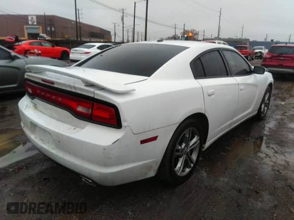 2013 Dodge Charger SXT with VIN 2C3CDXJG9DH541155, listed as a IAAI auction lot 41123246 with 118,392 mi miles and . Bid and sale history available at DreamBid. Image 4.