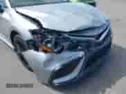 2021 Toyota Camry SE with VIN 4T1G11AK2MU445593, listed as a IAAI auction lot 43385464 with 57,907 mi miles and . Bid and sale history available at DreamBid. Image 6.