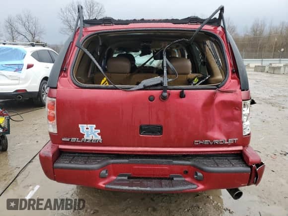 2000 Chevrolet Blazer LS z VIN 1GNCS13W5Y2155227, wystawiony jako Copart lot #43950875 z przebiegiem 153 365 mil mil oraz Nie do naprawy • Non repairable. Historia ofert i sprzedaży dostępna na DreamBid. Obrazek 6.