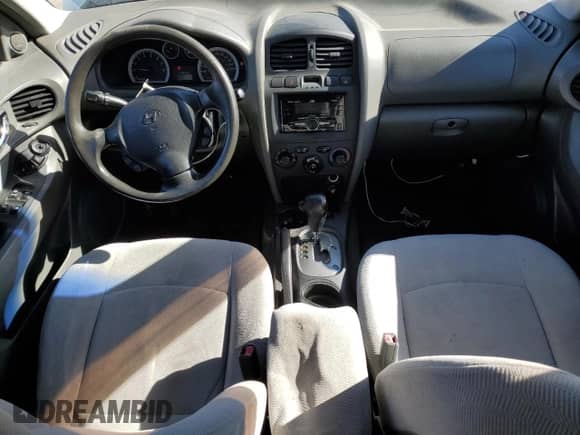 2006 Hyundai Santa Fe z VIN KM8SB13D86U109598, wystawiony jako Copart lot #85914725 z przebiegiem 269 728 mil mil oraz Czysty tytuł • Clean title. Historia ofert i sprzedaży dostępna na DreamBid. Obrazek 8.