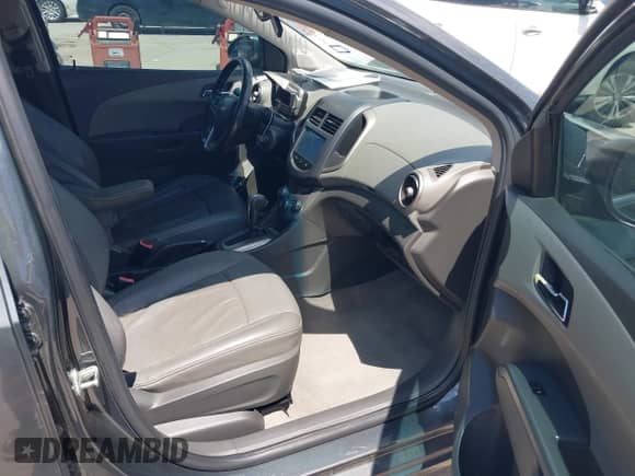 2013 Chevrolet Sonic LTZ with VIN 1G1JE5SH9D4102734, listed as a IAAI auction lot 42610235 with 179,837 mi miles and . Bid and sale history available at DreamBid. Image 5.