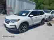 2021 Honda Pilot Touring 8-Passenger z VIN 5FNYF5H98MB037807, wystawiony jako IAAI lot #42136047 z przebiegiem 80 990 mil mil oraz . Historia ofert i sprzedaży dostępna na DreamBid. Obrazek 2.