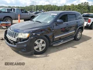 2011 Jeep Grand Cherokee Laredo с VIN 1J4RS4GG0BC658098, выставлен на аукционе Copart как лот 84580365 с пробегом 212 377 миль миль и Списание • Salvage title. История ставок и продаж доступна на DreamBid. Изображение 1.
