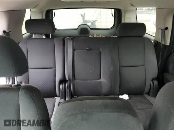 2009 Chevrolet Tahoe Commercial z VIN 1GNFK13029R131033, wystawiony jako Copart lot #81116854 z przebiegiem 128 684 mil mil oraz Nie do naprawy • Non repairable. Historia ofert i sprzedaży dostępna na DreamBid. Obrazek 10.