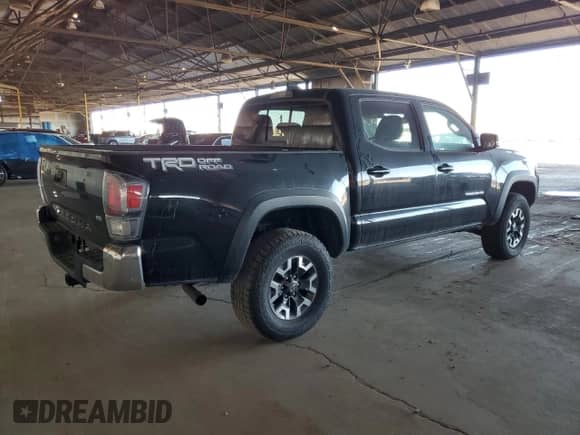 2023 Toyota Tacoma SR5 z VIN 3TMAZ5CN6PM199822, wystawiony jako Copart lot #84072485 z przebiegiem 58 711 mil mil oraz Szkoda całkowita • Salvage title. Historia ofert i sprzedaży dostępna na DreamBid. Obrazek 3.