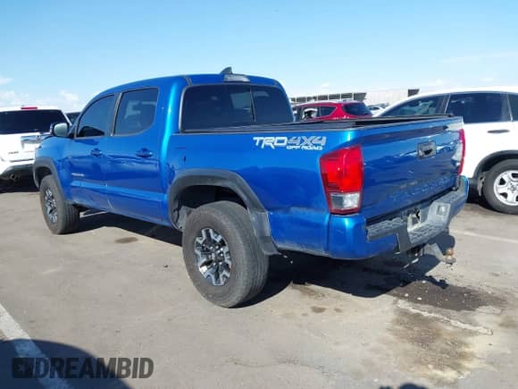 2017 Toyota Tacoma SR5 with VIN 5TFCZ5AN6HX089859, listed as a IAAI auction lot 43238076 with 99,273 mi miles and . Bid and sale history available at DreamBid. Image 3.