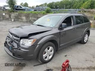 2016 Dodge Journey SE with VIN 3C4PDDAG5GT250417, listed as a Copart auction lot 69467695 with 120,528 mi miles and Salvage title. Bid and sale history available at DreamBid. Image 1.