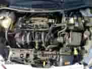 2013 Ford Fiesta S z VIN 3FADP4TJ1DM215176, wystawiony jako Copart lot #70181585 z przebiegiem 133 942 mil mil oraz Szkoda całkowita • Salvage title. Historia ofert i sprzedaży dostępna na DreamBid. Obrazek 11.