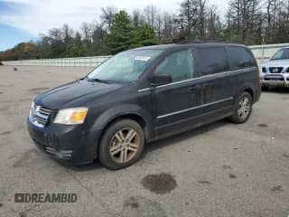 2009 Dodge Grand Caravan SXT with VIN 2D8HN54X99R512031, listed as a Copart auction lot 80029815 with 81,756 mi miles and Clean title. Bid and sale history available at DreamBid. Image 1.