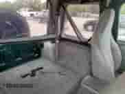 1999 Jeep Wrangler Sport with VIN 1J4FY19S7XP435204, listed as a Copart auction lot 83820835 with 263,738 mi miles and Clean title. Bid and sale history available at DreamBid. Image 10.