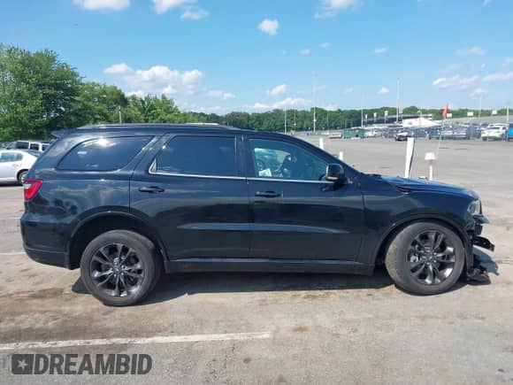 2021 Dodge Durango GT Plus with VIN 1C4RDJDG2MC574449, listed as a IAAI auction lot 42700043 with 26,289 mi miles and . Bid and sale history available at DreamBid. Image 13.