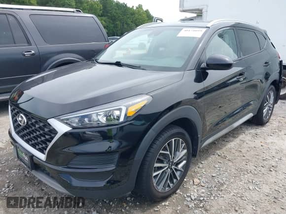 2021 Hyundai Tucson SEL with VIN KM8J3CAL9MU350176, listed as a IAAI auction lot 40178099 with 57,693 mi miles and . Bid and sale history available at DreamBid. Image 2.