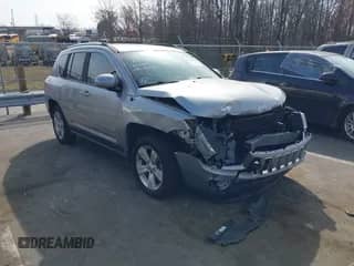 2015 Jeep Compass High Altitude with VIN 1C4NJCEA8FD400816, listed as a IAAI auction lot 41790013 with 107,923 mi miles and . Bid and sale history available at DreamBid. Image 1.