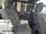 2021 Jeep Wrangler Unlimited Sport Altitude with VIN 1C4HJXDN0MW509619, listed as a Copart auction lot 66619475 with 54,606 mi miles and Salvage title. Bid and sale history available at DreamBid. Image 11.