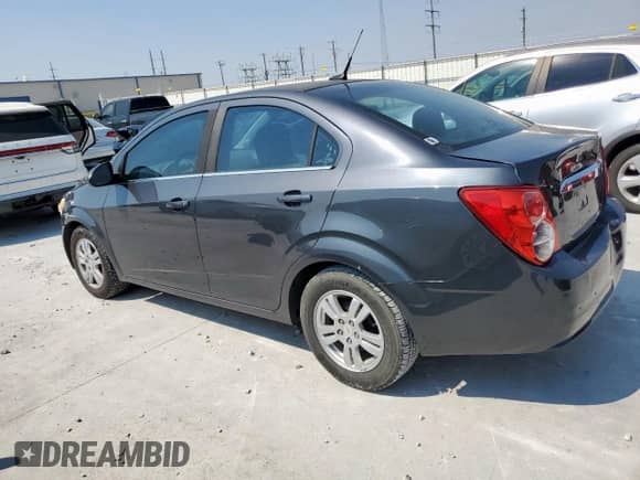 2012 Chevrolet Sonic LT с VIN 1G1JC5SH5C4184076, выставлен на аукционе Copart как лот 81641565 с пробегом 162 857 миль миль и Чистый • Clean title. История ставок и продаж доступна на DreamBid. Изображение 2.