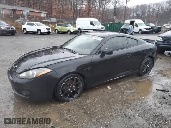 2008 Hyundai Tiburon GT с VIN KMHHN66F68U272717, выставлен на аукционе Copart как лот 83004014 с пробегом Не указан миль и Списание • Salvage title. История ставок и продаж доступна на DreamBid. Изображение 1.