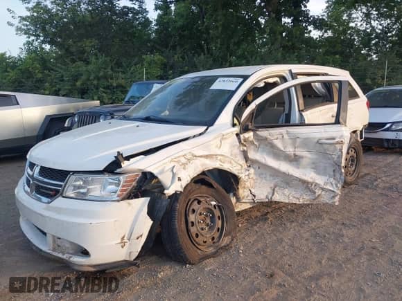 2015 Dodge Journey American Value with VIN 3C4PDCAB1FT587647, listed as a IAAI auction lot 42822060 with 168,503 mi miles and . Bid and sale history available at DreamBid. Image 6.