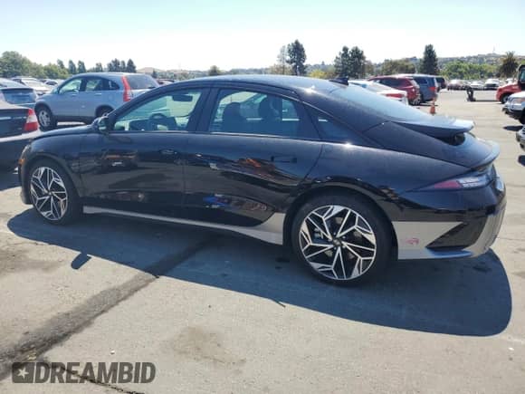 2023 Hyundai Ioniq 6 SEL with VIN KMHM34AA6PA037206, listed as a Copart auction lot 64690015 with 82,115 mi miles and Salvage title. Bid and sale history available at DreamBid. Image 2.